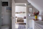 The shower-room can be accessed from bedroom 2 or the hallway.