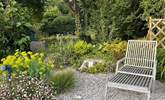 Relax a while in the pretty garden. - Thumbnail Image