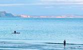 Head to Lyme Bay for a swim or paddle board. - Thumbnail Image