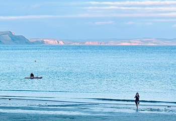 Head to Lyme Bay for a swim or paddle board.