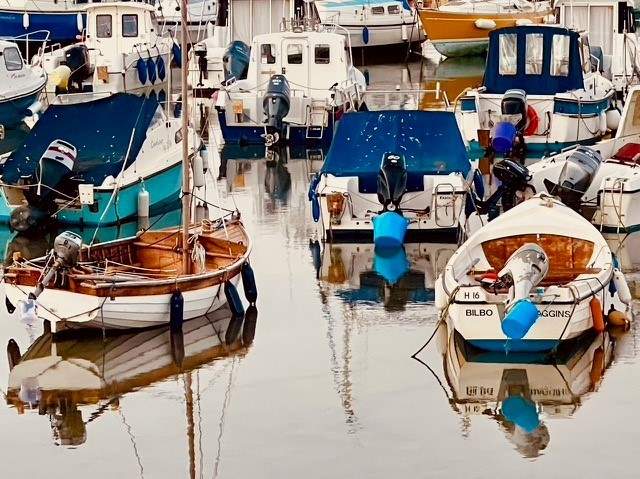 Colourful boats in the harbour at Lyme Regis.