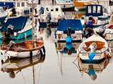Colourful boats in the harbour at Lyme Regis.