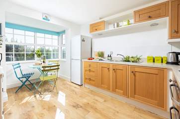 The light-filled kitchen has everything you will need.