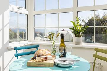 Sit and chat with the chef at the bistro table in the kitchen.