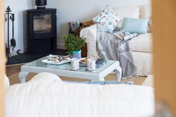 The super comfy sofas invite you to relax.
