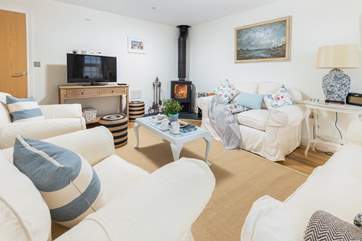 The sitting-room invites you to relax and unwind.