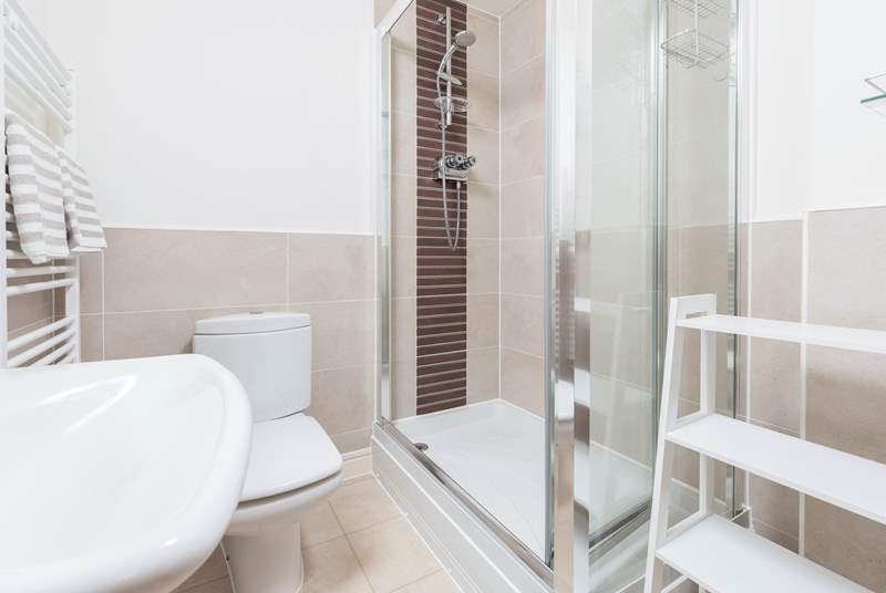 The super en suite shower-room to bedroom 1, ideal after a day on the beach.
