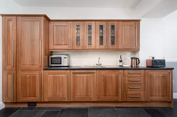 The well-equipped kitchen is perfect for cooking up your favourite holiday meal.