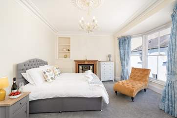 Bedroom two on the first floor has a king-size bed and views to the seafront.