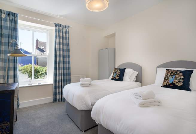 Bedroom one is a twin room with views over the courtyard on the first floor.