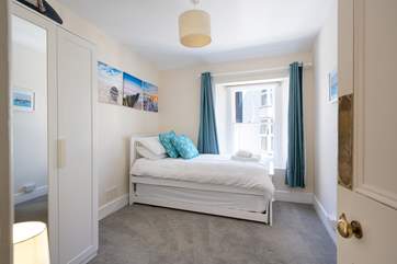 Bedroom four, on the second floor, has a single bed and a truckle bed.