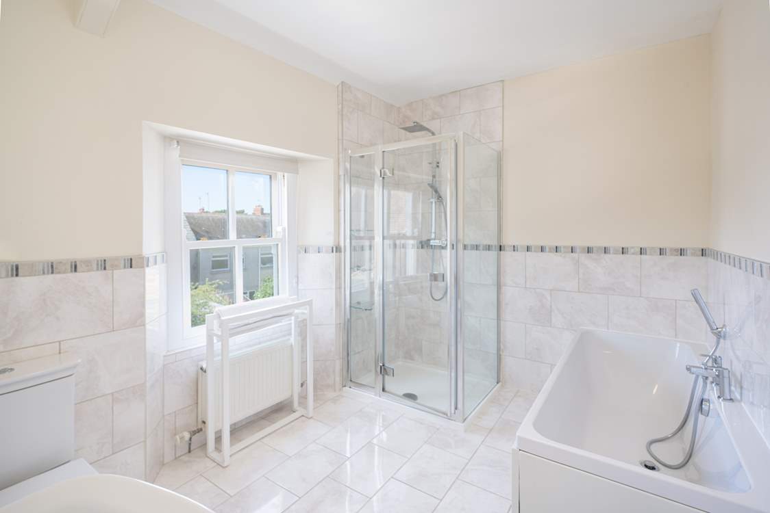 The family bathroom, on the second floor, has a bath and a separate walk-in shower.