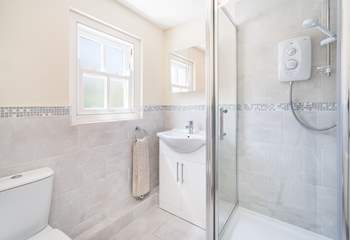 The shower room on the half-landing with a walk-in shower