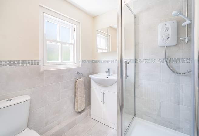 The shower room on the half-landing with a walk-in shower