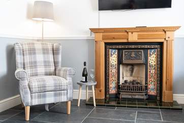 We're loving the fireplace with a coal-effect gas fire.