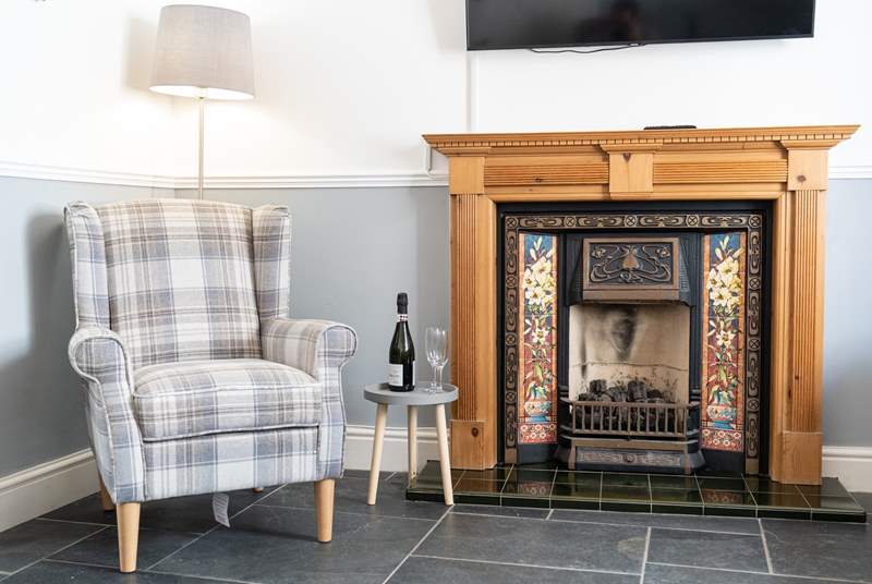 We're loving the fireplace with a coal-effect gas fire.
