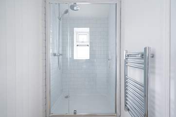 The shower-room is modern and light.