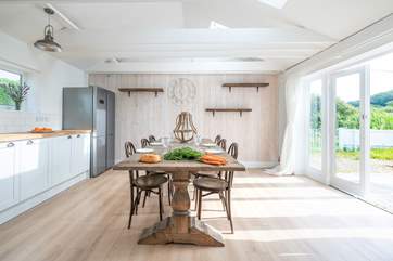The double doors open onto the gorgeous patio and garden area, making this the ideal spot to host all the family on those summer days.
