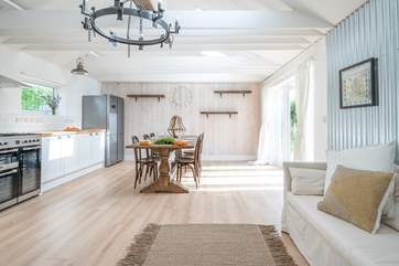 The gorgeous modern style kitchen and dining-room has plenty of space.