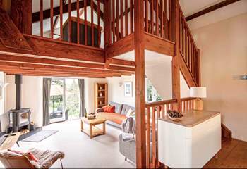 The living-room leads off from the kitchen and into the garden .Mind the steps between the rooms.