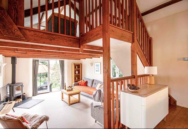 The living-room leads off from the kitchen and into the garden .Mind the steps between the rooms.