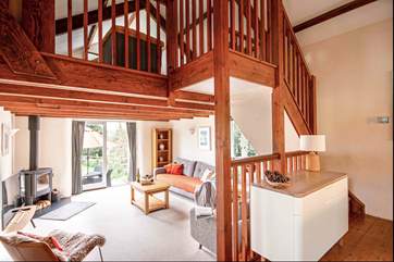 The living-room leads off from the kitchen and into the garden .Mind the steps between the rooms.