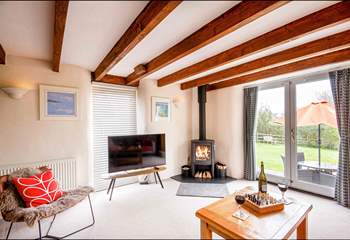 In summer throw open the doors to the garden or snuggle up by the fire in winter, this is the perfect Roseland retreat whatever the time of year.