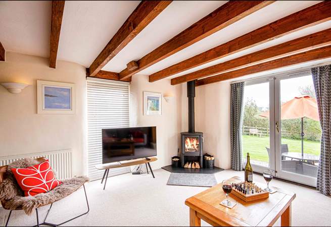 In summer throw open the doors to the garden or snuggle up by the fire in winter, this is the perfect Roseland retreat whatever the time of year.