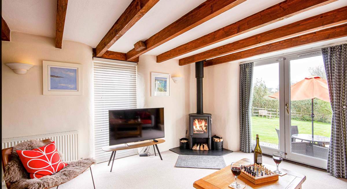 In summer throw open the doors to the garden or snuggle up by the fire in winter, this is the perfect Roseland retreat whatever the time of year.