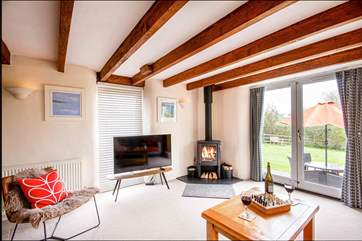 In summer throw open the doors to the garden or snuggle up by the fire in winter, this is the perfect Roseland retreat whatever the time of year.