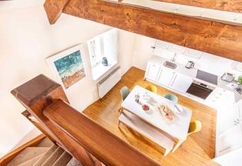 The hallway to the left leads to the bedrooms and bathroom. 