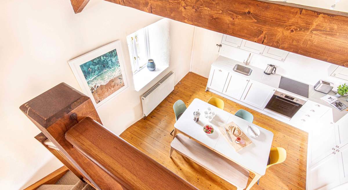 The hallway to the left leads to the bedrooms and bathroom. 