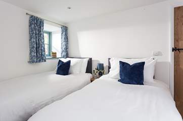 Bedroom three has a 'zip and link' bed which can be made into twins or a super-king size bed.