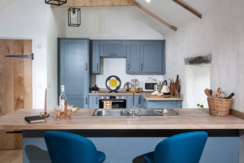 The kitchen is a fabulous shade of blue, during the renovation we named it Dungarth blue. 