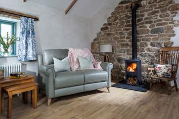 The living area has a lovely wood-burner making it a very cosy place to be during those chillier months.
