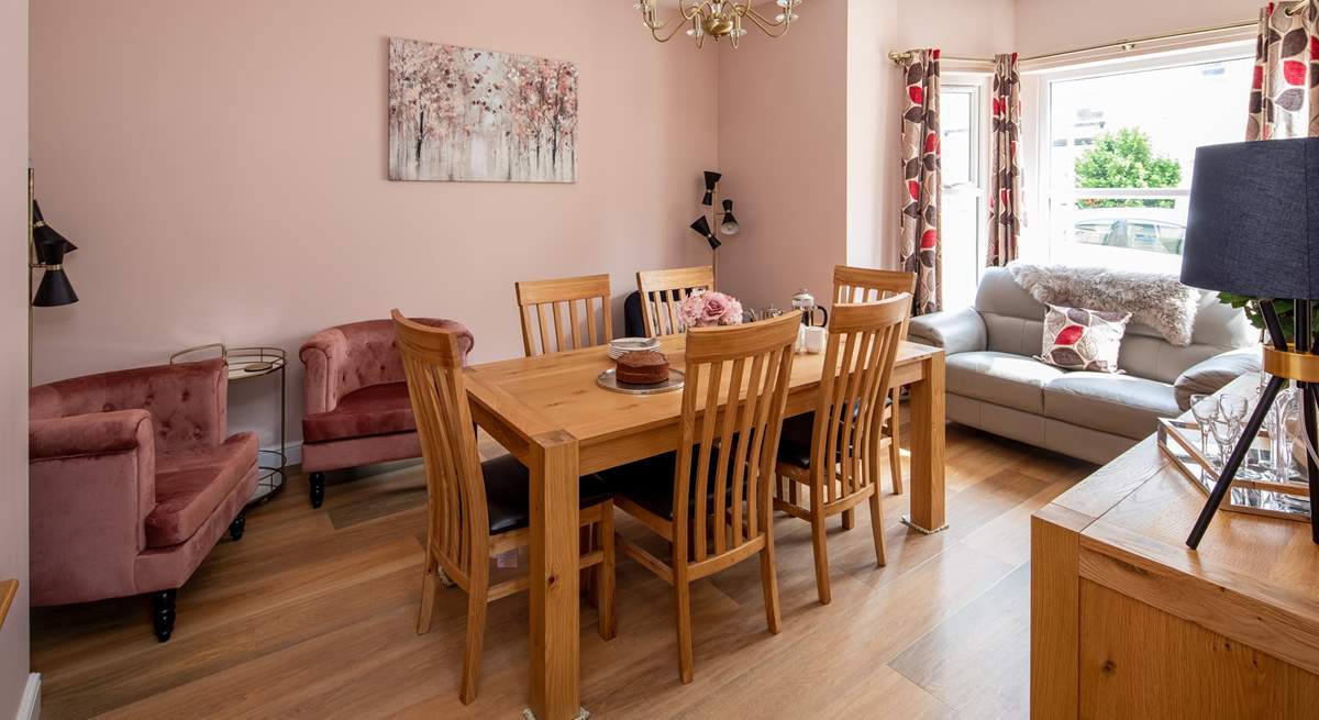 The separate dining-room has easy chairs for a quiet read with a good book.