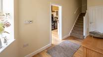Staircase leads from the ground floor to the first floor sitting-room and bedrooms on the first and second floor.