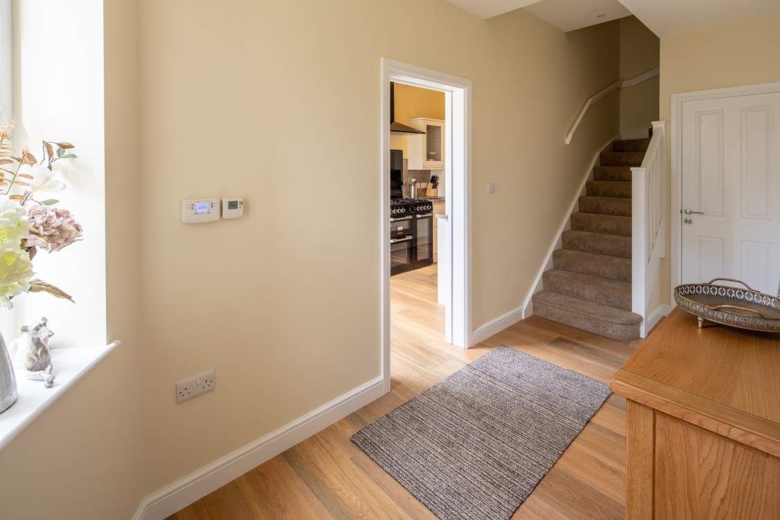 Staircase leads from the ground floor to the first floor sitting-room and bedrooms on the first and second floor.