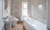 The bath is the ideal place for a soak after a busy day. - Thumbnail Image