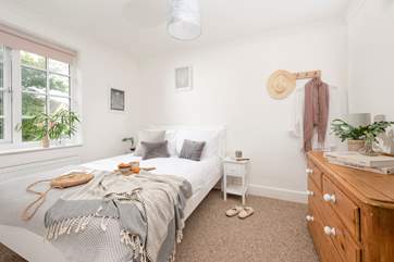 Bedroom 4 is welcoming and bright.
