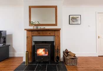 The warming wood-burner will keep you toasty at any time of year.