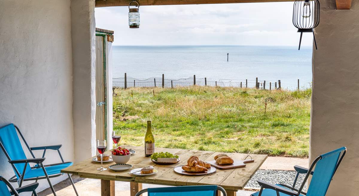 A sheltered space for dining al fresco and soaking up the views.