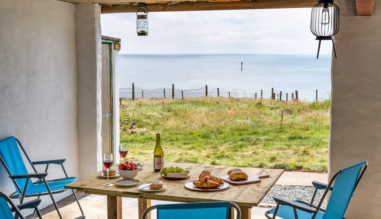 A sheltered space for dining al fresco and soaking up the views.
