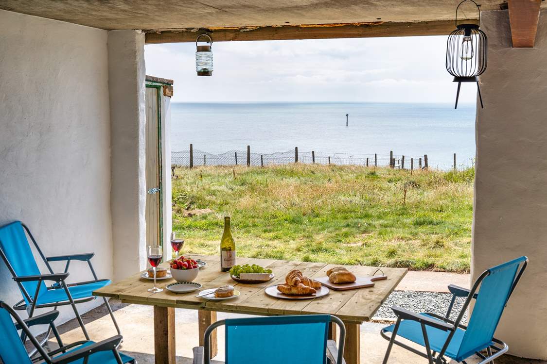 A sheltered space for dining al fresco and soaking up the views.