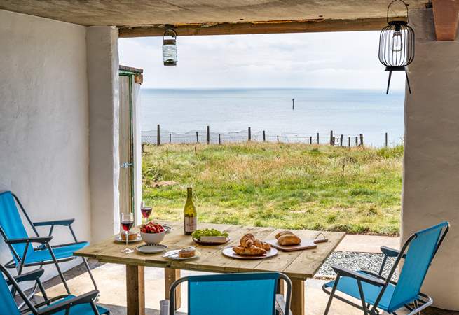 A sheltered space for dining al fresco and soaking up the views.