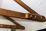 Beautiful beams are one of the original features found in this property. 
