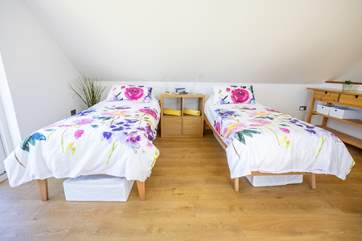The pretty twin beds.