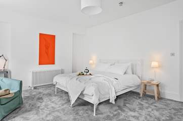 Bedroom 4 is another spacious room with a super-king size bed.