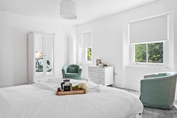 The spacious bedroom 4 is a bright room with storage for your belongings.