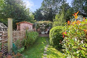 Sit on the decking at the bottom of the garden with a book, a glass of bubbly and listen to the birdsong.